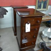 A pair of Victorian mahogany bedside chests with four drawers on plinth base