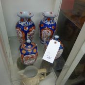 Four Japanese Imari vases two pairs