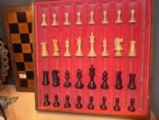 A leather cased chess set wooden Staunton style pieces complete