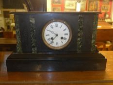 A Victorian slate mantle clock with Arab