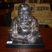 A silvered seated Buddha