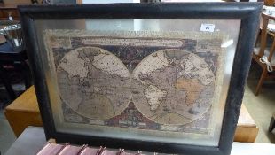 A terrestrial print framed and glazed