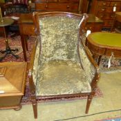 A pair of Regency style mahogany tub chairs with swan relief