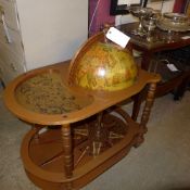 A novelty globe form drinks cabinet