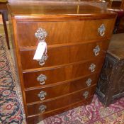 A mid C20th walnut chest of five drawers with metal drop handle W 76 D 47 H 103 cm