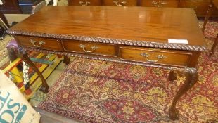 A Chippendale mahogany library table the