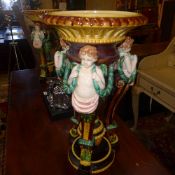A pair of Majolica style large centre pi