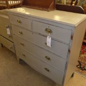 A distressed grey painted chest having two short above three long drawers an bracket feet W 102 D 48