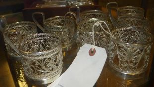 A set of eight white metal Indian filigr