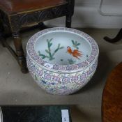 A Chinese fish bowl with enamel floral d