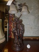 A Victorian design bronzed table lamp in