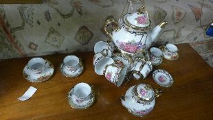 A porcelain teaset on stand and similar