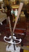 Two war clubs with geometric basket weav