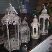 A collection of glass hanging lanterns