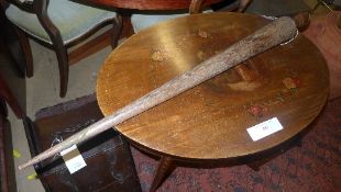 A vintage hardwood weaving stick