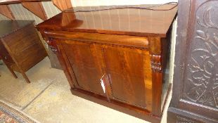 A Victorian flame mahogany chiffonier the cushion frieze drawer above panel doors on plinth base