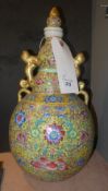 A pair of Chinese famille Rose gourd vas