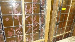 A pair of painted and stained panel door