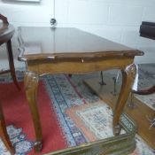 An oak low table the parquetry top raise