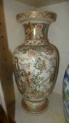 A bulbous Satsuma vase decorated with im