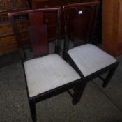 A pair of splat back side chairs and a V