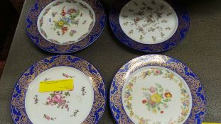 A collection of four porcelain plates gi