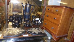 A apprentice chest of drawers with bun h