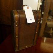 A leather style bottle carrier with carr