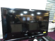 E Motion Widescreen Television complete with Stand & Remote Control