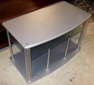 1 x TV Stand - Ref: FC519 - Features A Perspex Shelf and Silver / Chrome Colour Finish - H55 D49