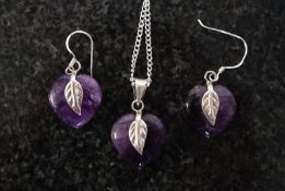 A pair of white metal 925 silver and amethyst earrings along with a matching necklace in heart shape