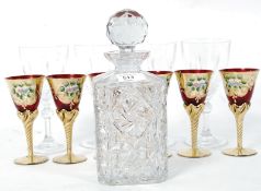 4 matching crystal decanters and 6 other coloured glasses