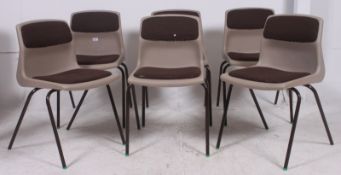 A set of 6 vintage stacking chairs of plastic form with ebonised metal frames, plastic seats with