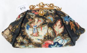 A c1920's Japanese oriental silk and wirework ladies purse. Depicting traditional oriental scenes