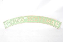 A reproduction cast iron Flying Scotsman railway plaque sign