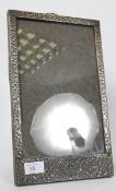 A good Arts & Crafts hammered pewter rectangular photograph / picture frame with easel back.  Weight