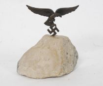 A 20th century bronze German Eagle and Swastika mounted on a granite base