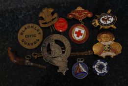 A collection of enamel badges to include Red Cross East Lancs, Blackley Civic Guard, Touch Not The