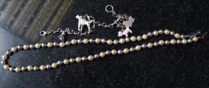 Two white metal / silver items - a faux pearl necklace and a chain bracelet