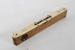 An Oak and brass Spirit Level stamped John Rabone Makers Birmingham