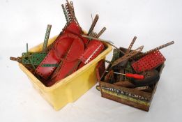 A large quantity of vintage early 20th century Meccano loose in two boxes ( see illustration )