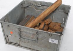 A collection of printers stencil blocks together with an Industrial Tote tray of cast metal form