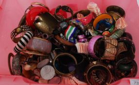 A large collection of vintage / retro costume jewellery bangles please see images