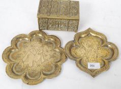 2 19th century Indian brass trays of shaped forms together with a brass casket having scenes of