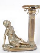 A deco gilt plaster lady figurine lamp raised on plinth base with electrics atop