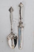 A good  Edwardian Art Nouveau silver plated large letter knife together with a similar spoon, the