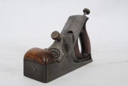 A Norris Adjustable Steel Smoothing Plane, with wooden infill and handle,  Norris iron.