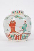 A 19th century Qing Dynasty ginger jar / vase of bulbous form decorated in red and green with scenes