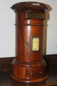 A Victorian style carved wood and brass desktop / floor standing miniature postbox with brass post