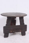 An unusual early 20th century carved hardwood table believed to have been made by a soldier